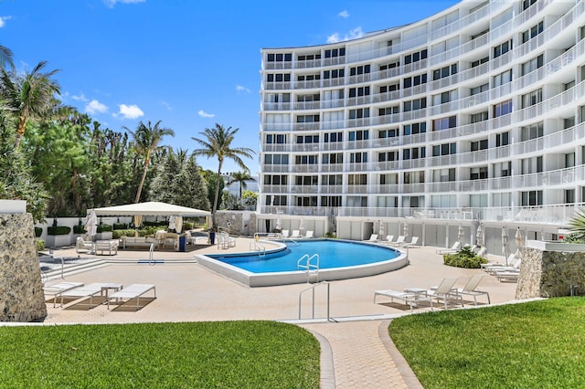 view of swimming pool with a gazebo, a yard, and a patio area