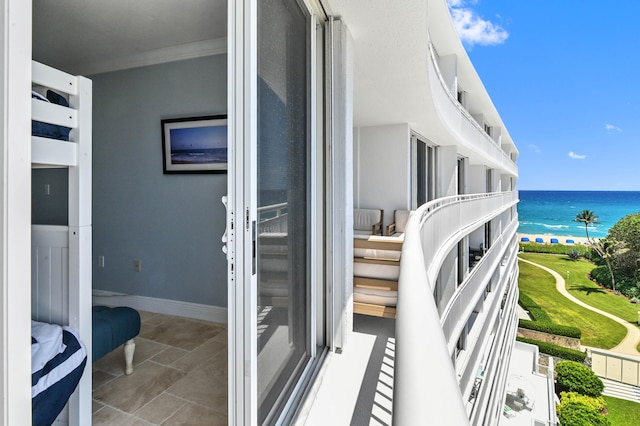 balcony featuring a water view