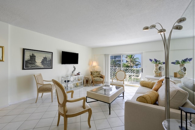 tiled living room with a textured ceiling