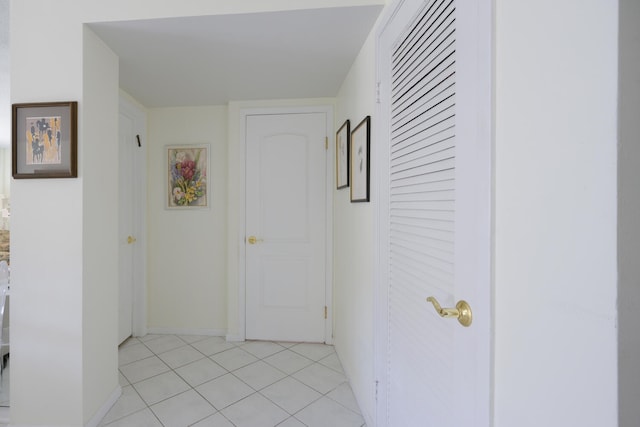 hallway with light tile floors