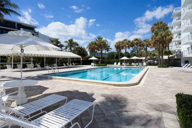 view of swimming pool featuring a patio