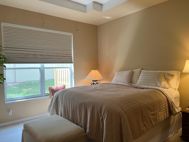 bedroom with light tile patterned flooring