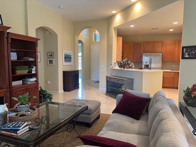 living room with light tile patterned flooring