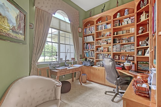 home office with light tile floors