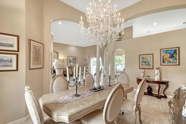 dining room featuring a chandelier and crown molding