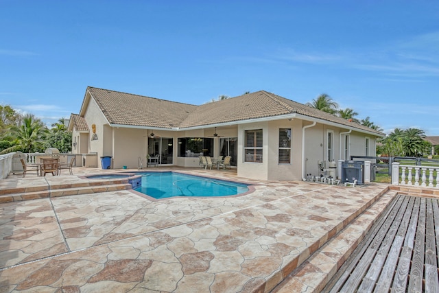 view of pool featuring a patio area and a deck