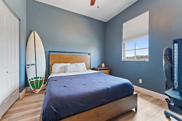 bedroom featuring ceiling fan and light wood-type flooring