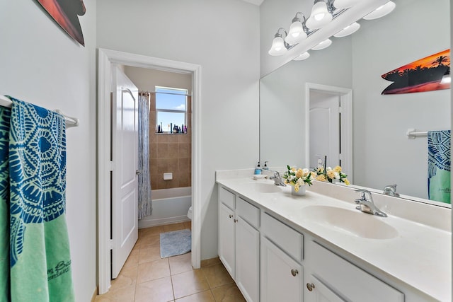 full bathroom featuring toilet, vanity, shower / bathtub combination with curtain, and tile patterned flooring