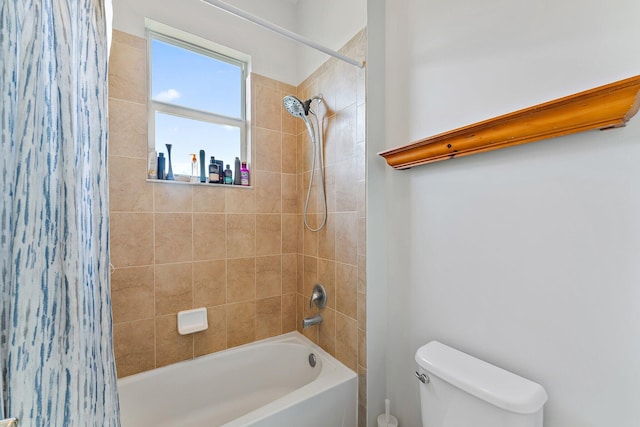 bathroom with toilet and shower / bathtub combination with curtain