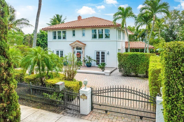 mediterranean / spanish house with french doors