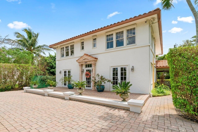 exterior space with a patio and french doors