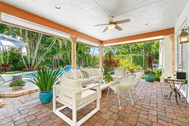 view of patio / terrace featuring an outdoor living space and ceiling fan