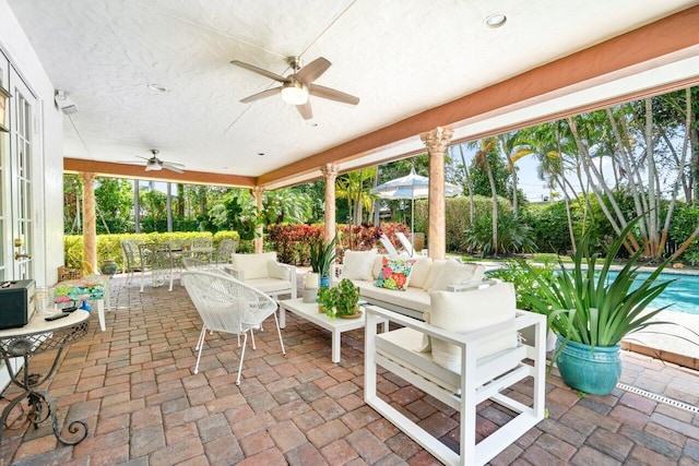 view of patio / terrace with outdoor lounge area and ceiling fan