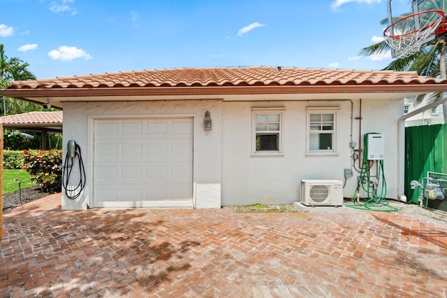 exterior space featuring ac unit