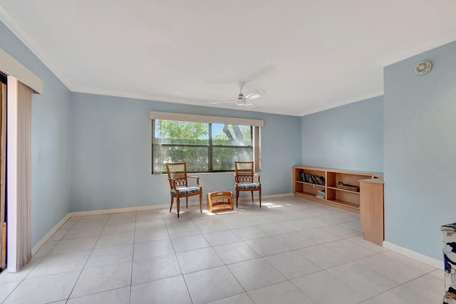 living area featuring ceiling fan, ornamental molding, and light tile patterned flooring