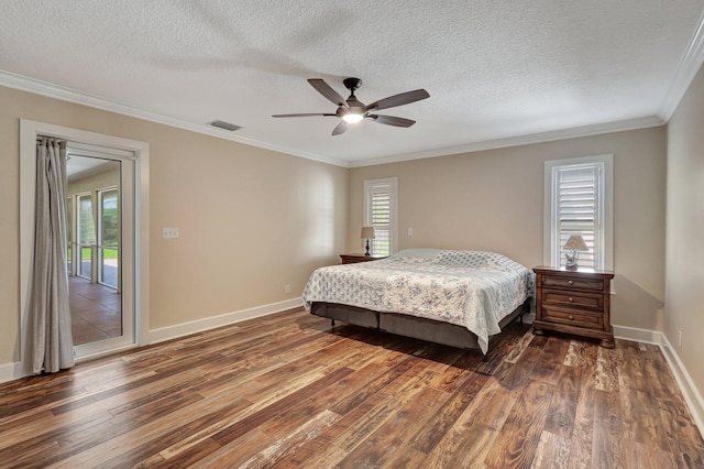 bedroom with crown molding, a textured ceiling, dark hardwood / wood-style flooring, access to outside, and ceiling fan