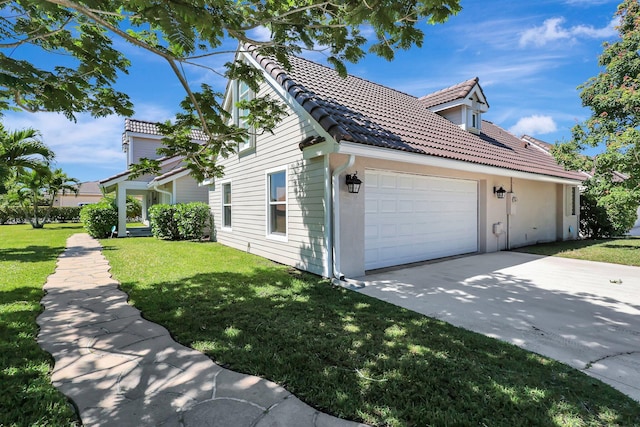 view of property exterior featuring a garage and a lawn