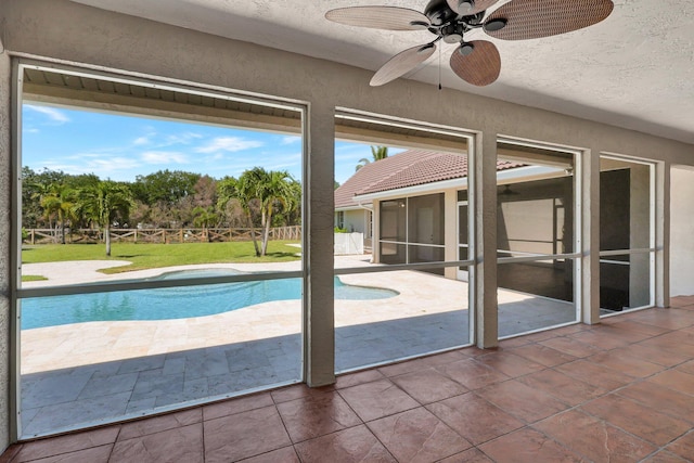 view of pool with ceiling fan