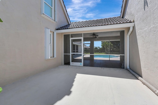 view of patio with ceiling fan