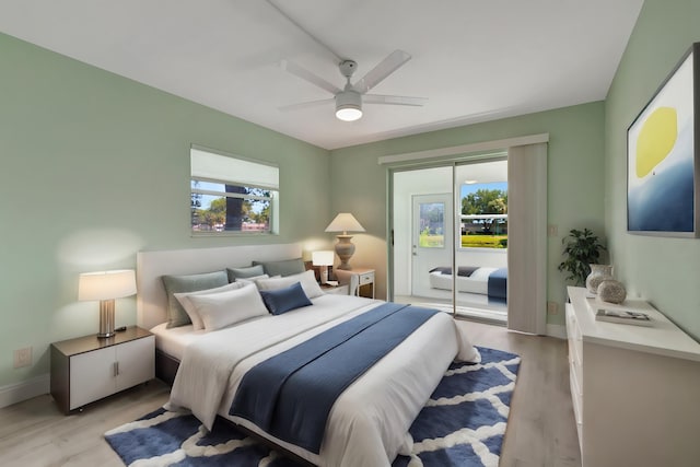 bedroom with light hardwood / wood-style flooring, a closet, and ceiling fan