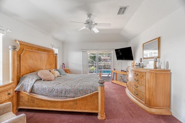 carpeted bedroom with vaulted ceiling, ceiling fan, access to exterior, and a textured ceiling