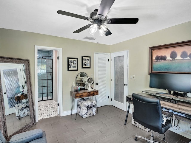 office featuring french doors and ceiling fan