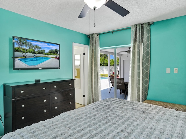 carpeted bedroom with access to outside, ceiling fan, and a textured ceiling