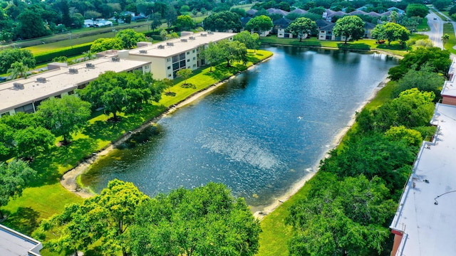 bird's eye view with a water view