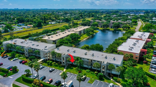 drone / aerial view with a water view