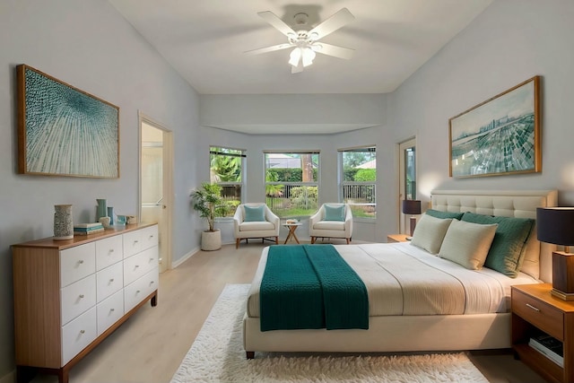 bedroom featuring ceiling fan and light hardwood / wood-style floors