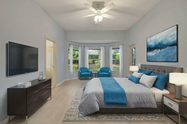 bedroom featuring light wood-type flooring and ceiling fan