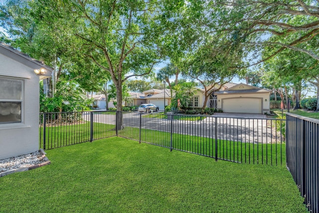 view of yard featuring a garage