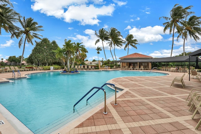 view of swimming pool featuring a patio