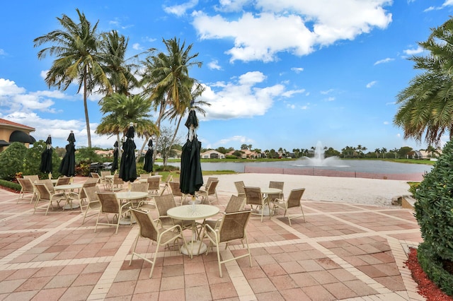 view of patio / terrace featuring a water view