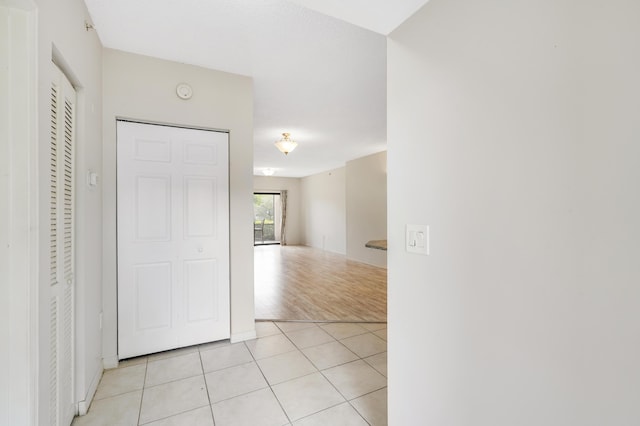 hall with light wood-type flooring