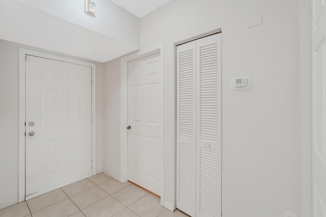 interior space featuring light tile patterned floors