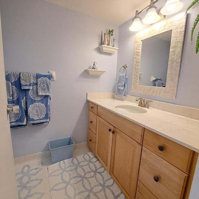 bathroom with vanity and tile patterned floors