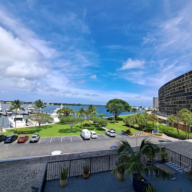 surrounding community featuring a water view