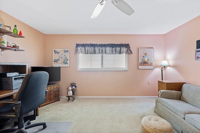 office area featuring light colored carpet and ceiling fan