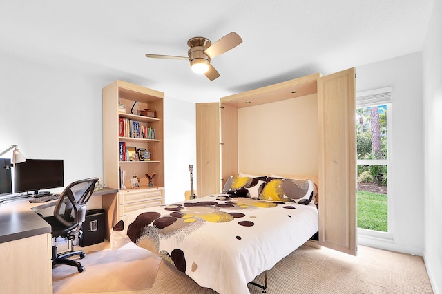 bedroom featuring light carpet and ceiling fan