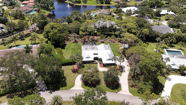 bird's eye view with a water view