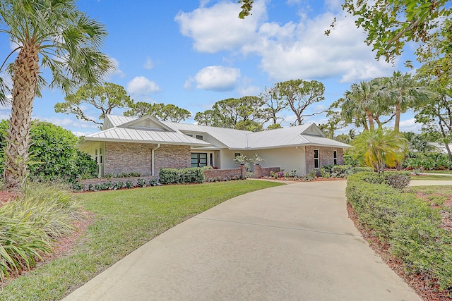 ranch-style home with a front yard