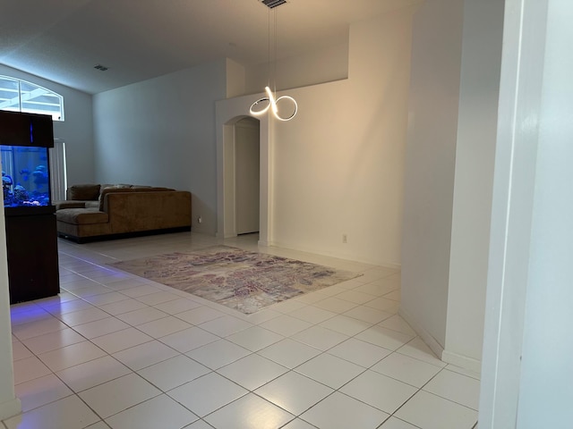 spare room featuring light tile patterned floors