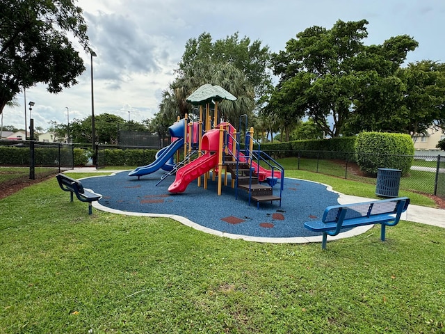 view of playground featuring a yard