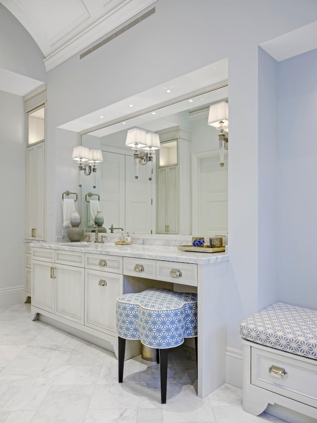 bathroom featuring tile floors, double vanity, and ornamental molding