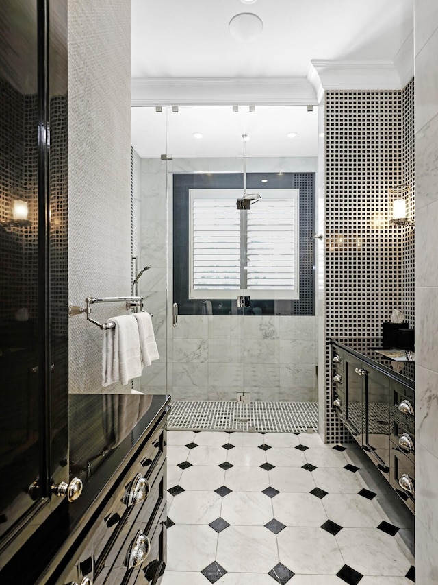 bathroom with crown molding, vanity, and tile floors