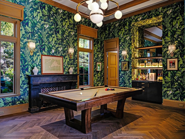 playroom with ornamental molding, a healthy amount of sunlight, dark parquet flooring, and pool table