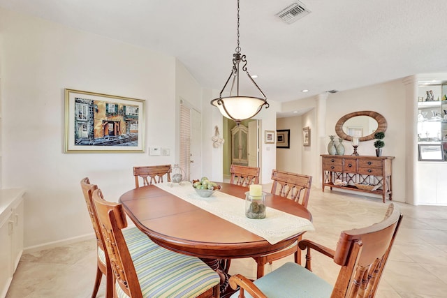 kitchen featuring light tile flooring, light stone countertops, black appliances, backsplash, and sink