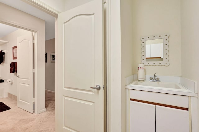 bathroom featuring oversized vanity and tile floors