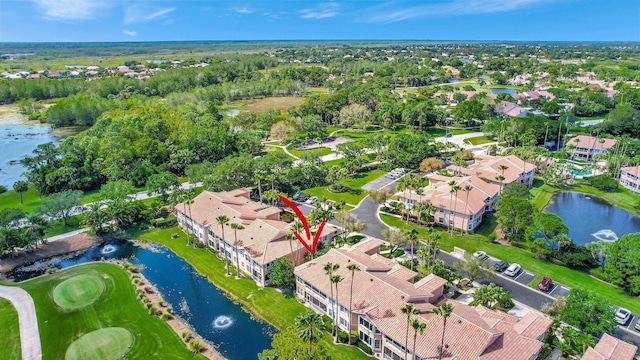 bird's eye view with a water view